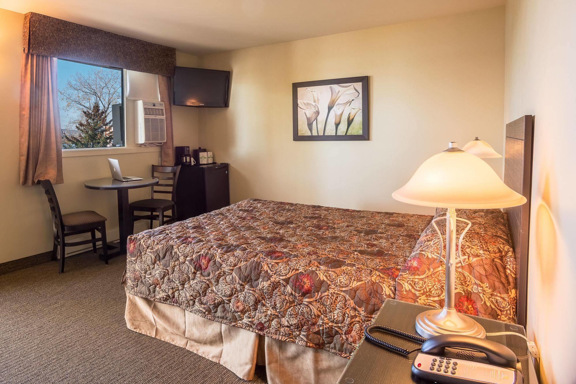 Motel Du Fleuve Броссар Экстерьер фото